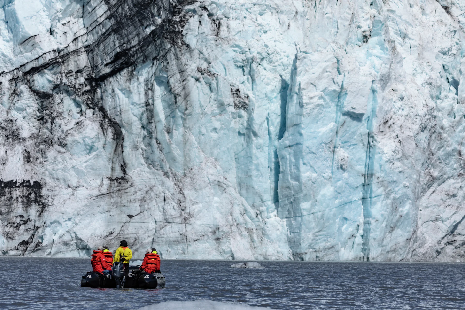  Expedition boat cruising to the great Harvard Glacier in College Fjord, Alaska. Credit:  Oscar Farrera / Hurtigruten Expeditions