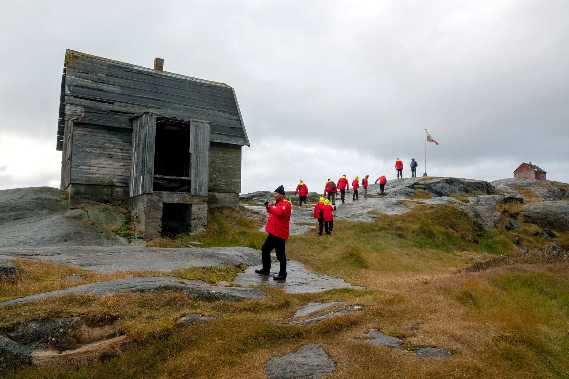 Guests hiking through Sisimiut in Greenland.