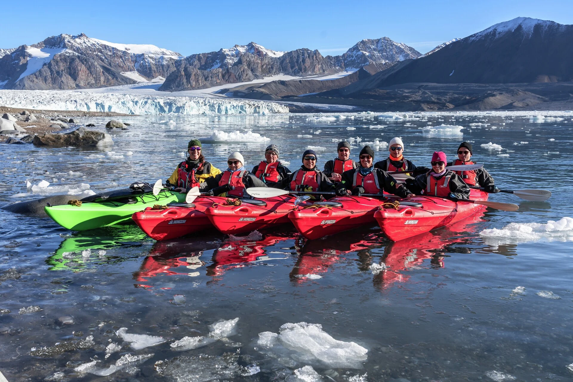 Kayaking in the 14 July Bay in Krossfjorden, Svalbard. Credit:  Hurtigruten Expeditions