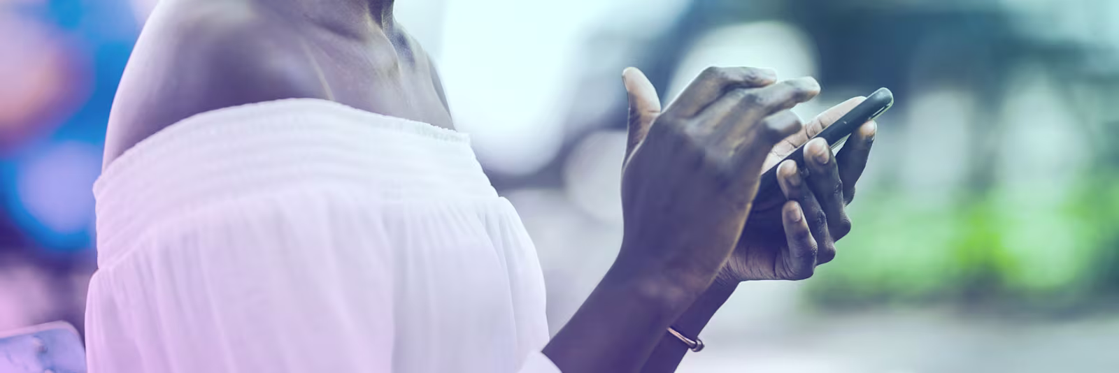 An image of someones hands holding a phone