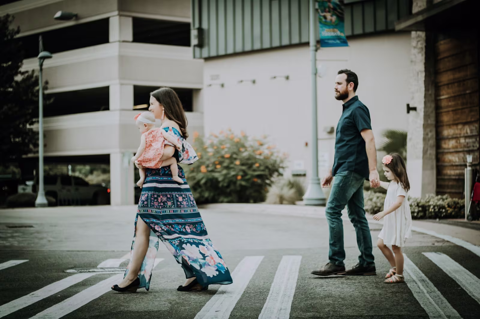 Family migrating A family of four crossing the road