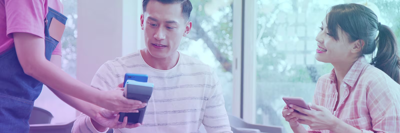 An image of someone using a card machine