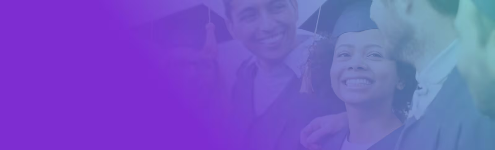 A group of graduates looking at each other and smiling