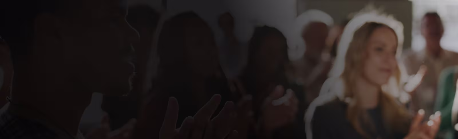 Blurred group A blurred image of a group of people in a room