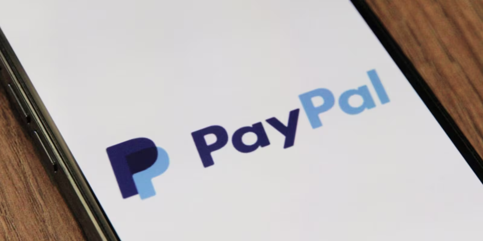 marques-thomas-gs9uci8JvGw-unsplash--1- (1) Smartphone avec un logo PayPal