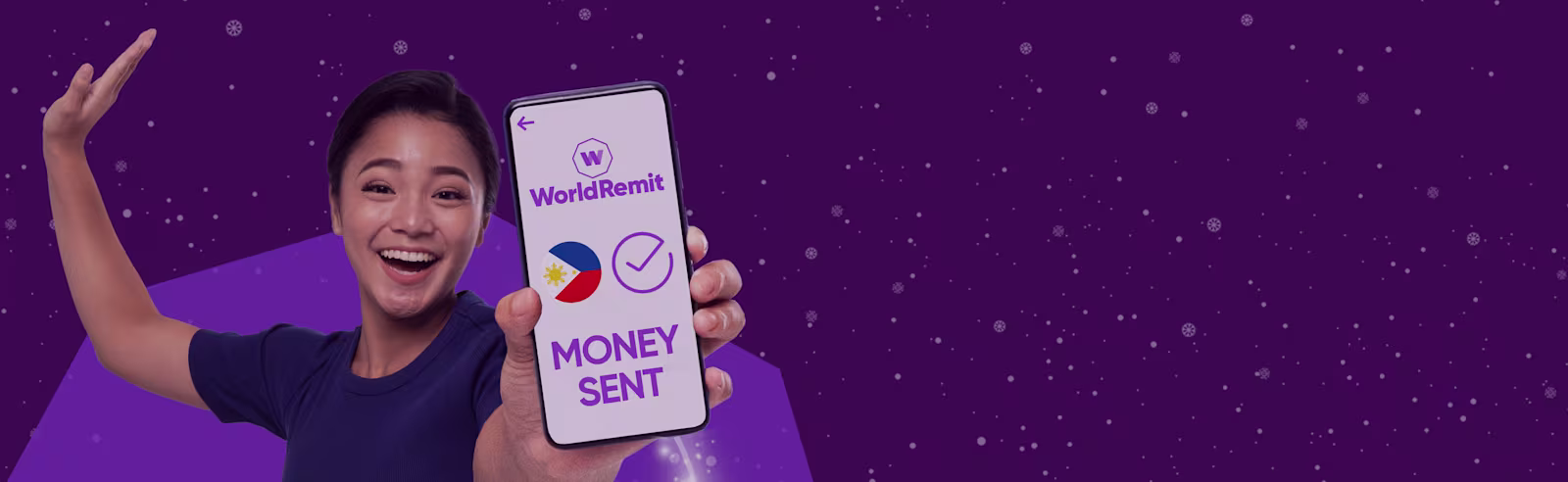 An image of a Filipino woman holding out a smartphone that displays the WorldRemit app