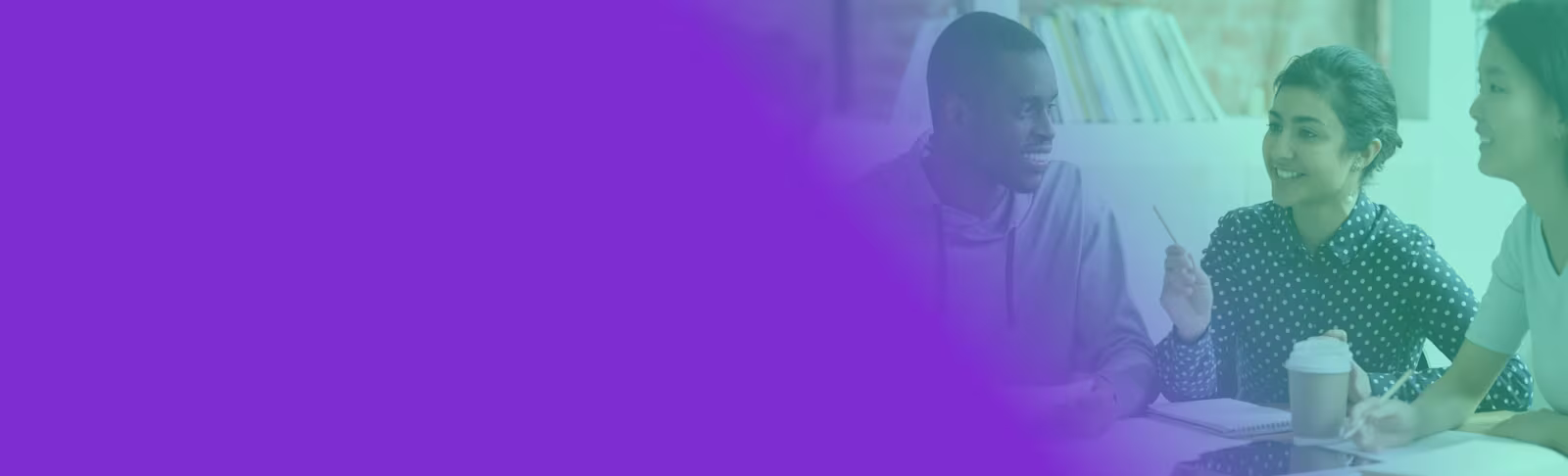 A group of international students collaborating around a table