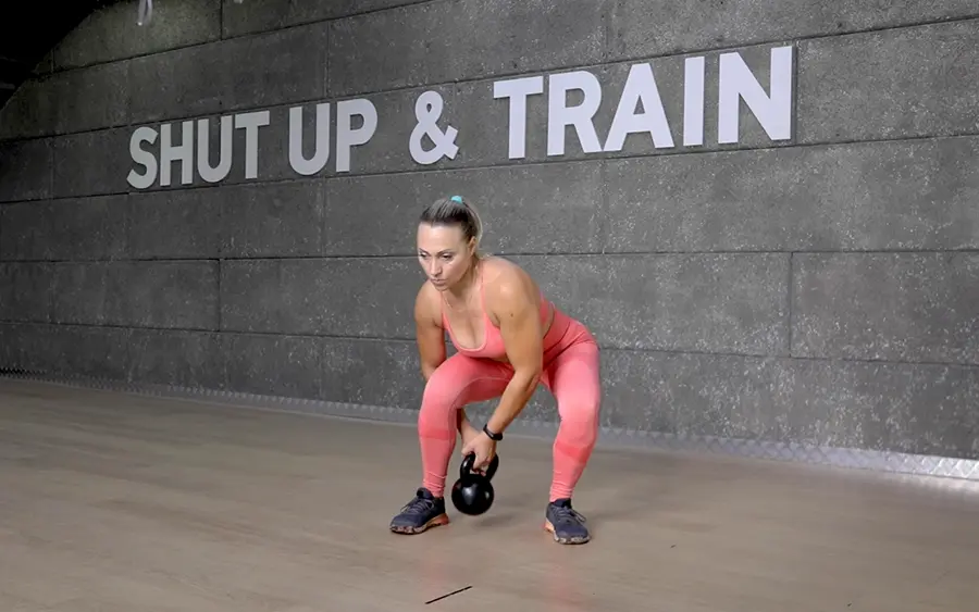 How to perform a kettlebell figure of 8