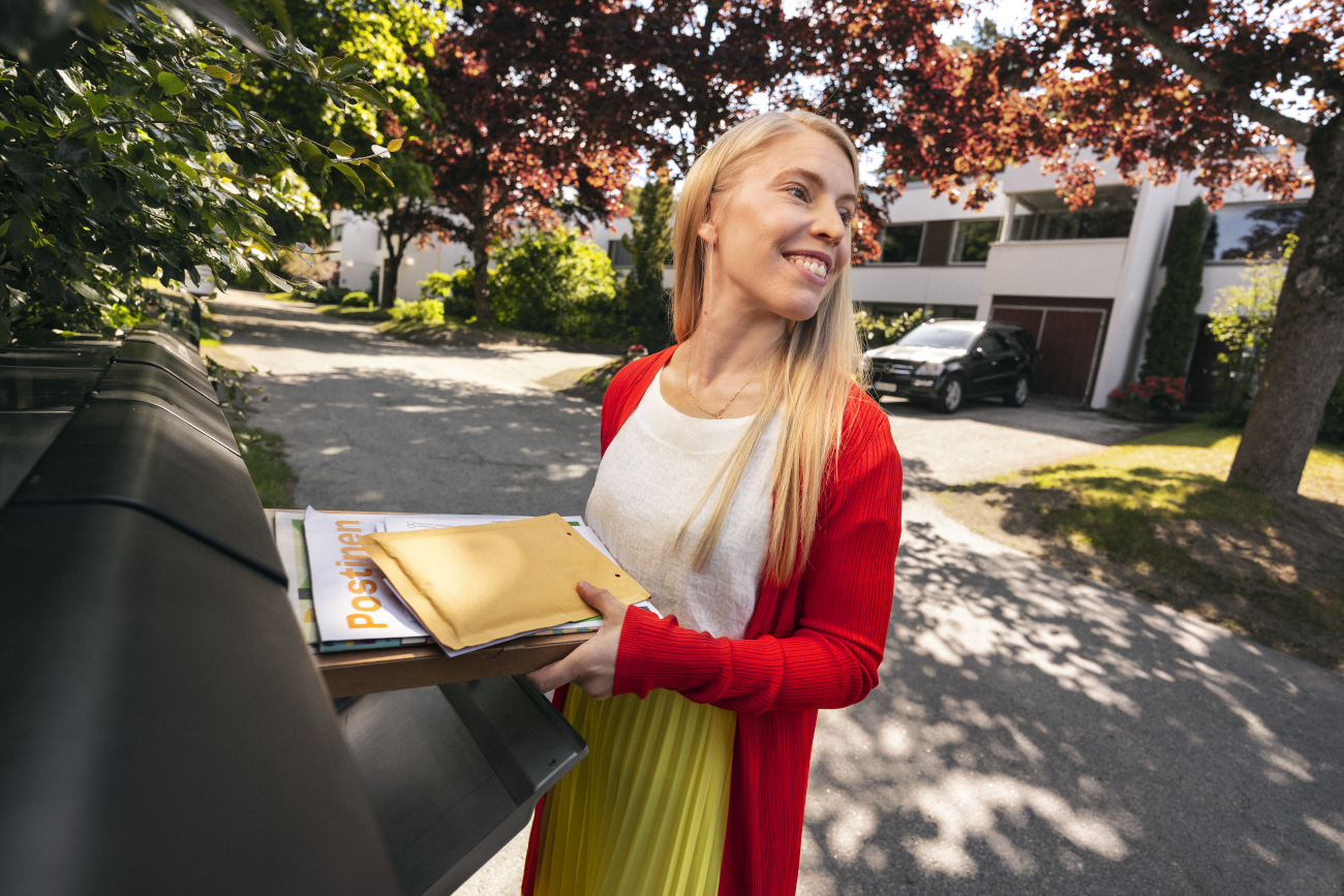 Woman at mailbox