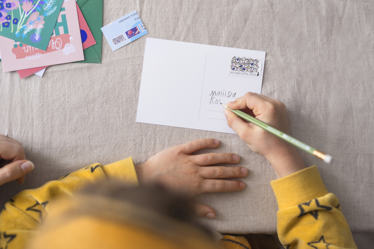 Child writing a card