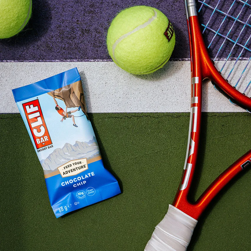 CLIF BAR Chocolate Chip with tennis balls and racket