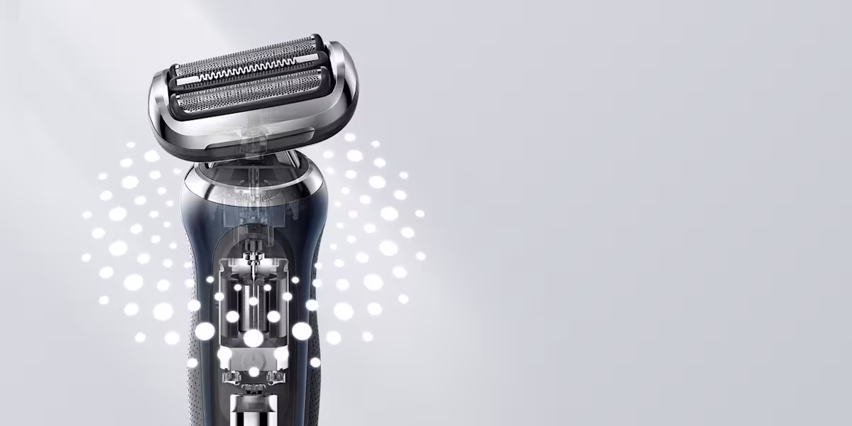 Braun electric foil shaver with 360Flex technology, cutaway view revealing internal motor and flexible pivot mechanism Braun electric foil shaver with 360Flex technology, cutaway view revealing internal motor and flexible pivot mechanism