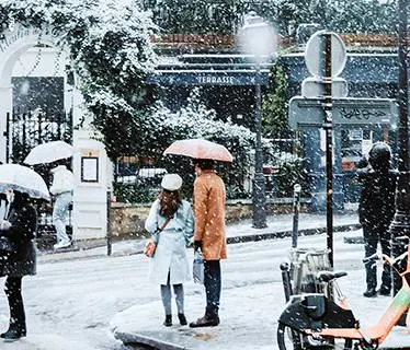 Paris France street scene in snow