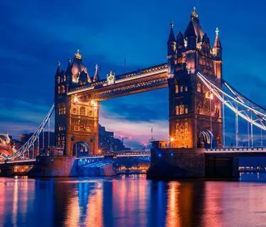 Glowing Big Ben in London UK on a snowy night