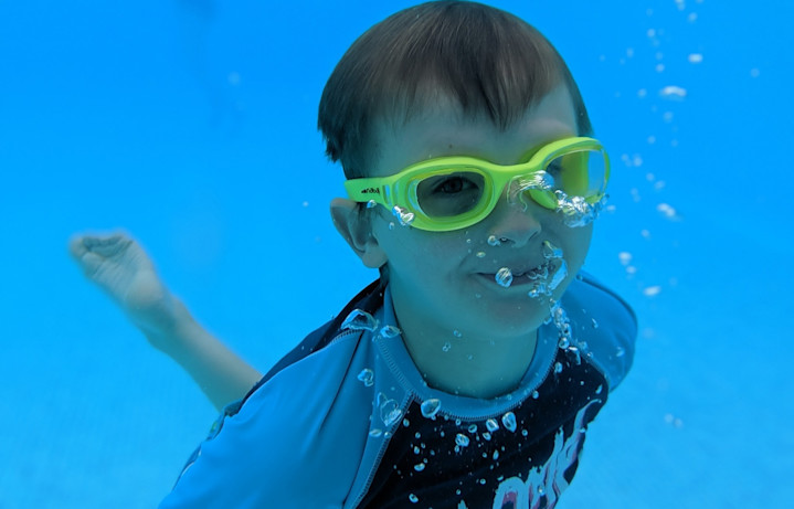 Sam underwater at Callow Top Campsite in Ashbourne