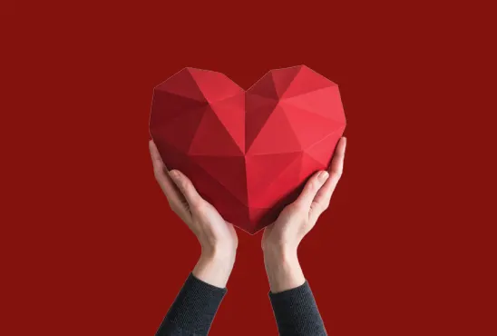 Hands holding poly heart