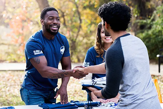 Volunteers shaking hands