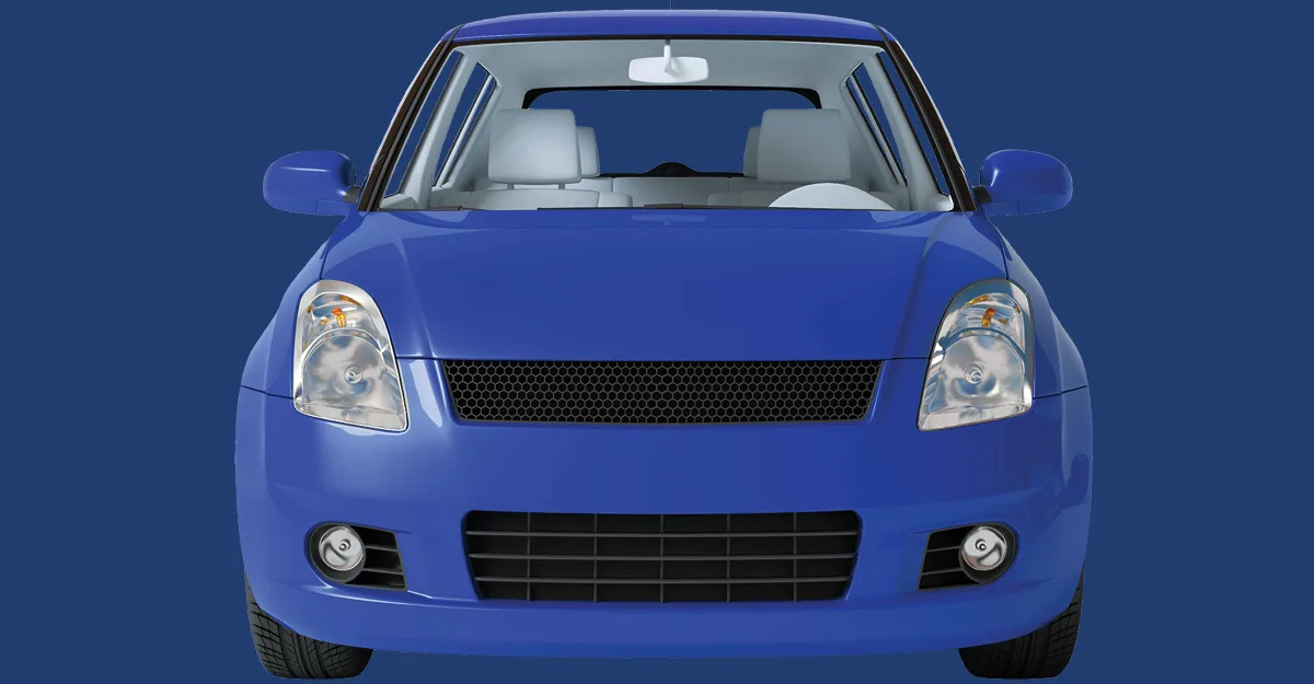 Front view of a blue compact car with white interior against a matching blue background