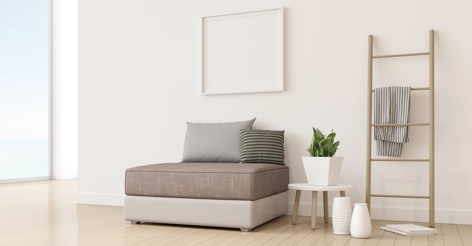 Minimalist living room with beige sofa, striped pillows, blank wall frame, wooden ladder, plant, and neutral decor.