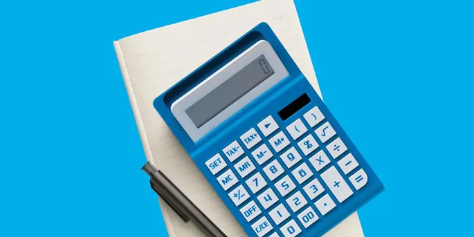 Blue calculator with white buttons resting on a notepad with a pen, placed on a bright blue background.