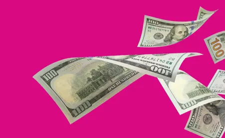Falling cash on pink background