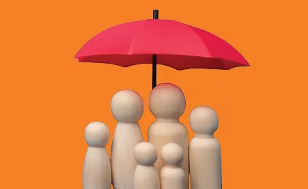 Umbrella over wood figurines on orange background