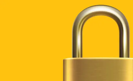 Padlock on yellow background