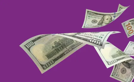 Falling cash on purple background