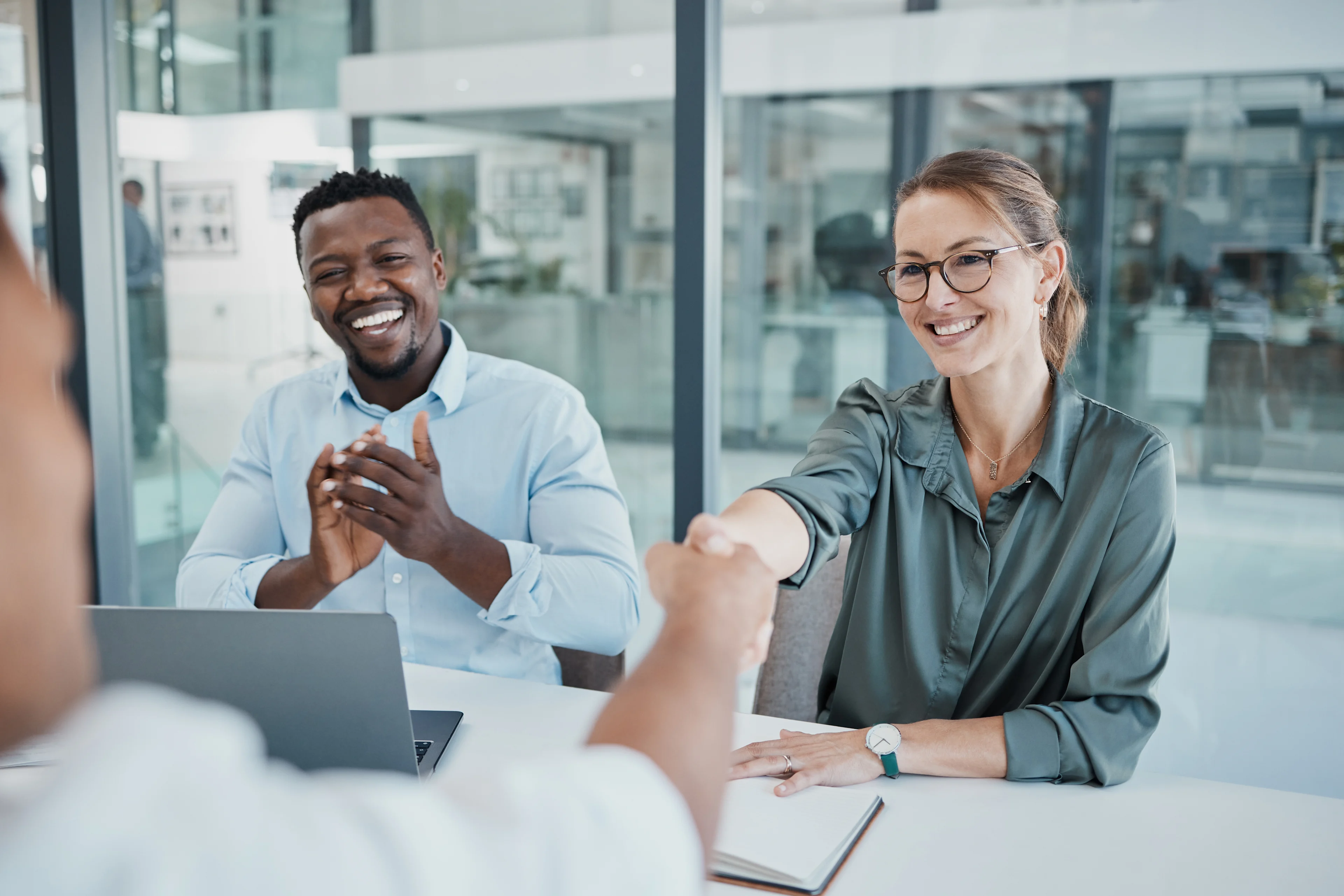 People making a deal at conference table