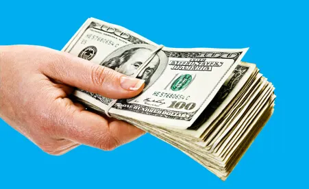 Hand with Cash on blue background