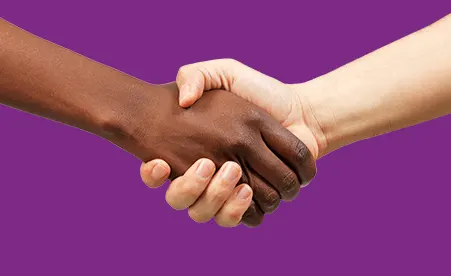 Handshake on purple background