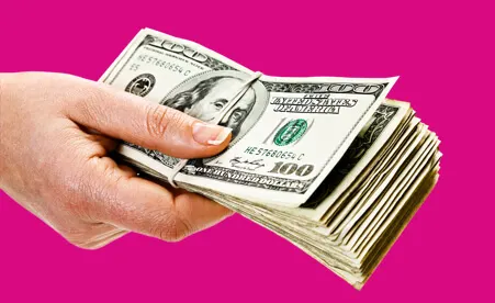Hand with Cash on pink background