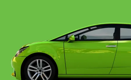 Green car on green background