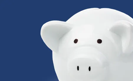 White Piggy Bank on navy background