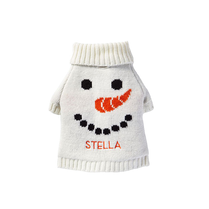 the snowman wearing a white sweater