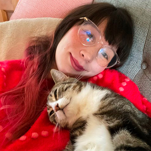 Kim-Joy snuggles with her cat Mochi