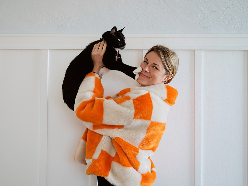 Lisa Buhler with her black cat