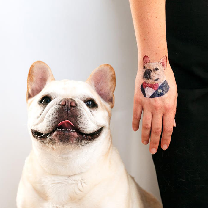  french bulldog tattoo on a hand