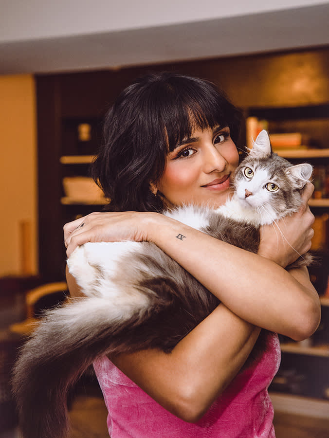 Aparna Brielle holding her cat