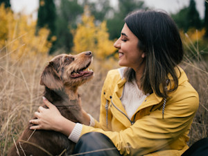 happy woman with a dog