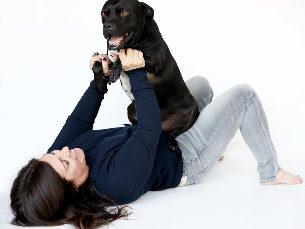 Corry playing with her dog