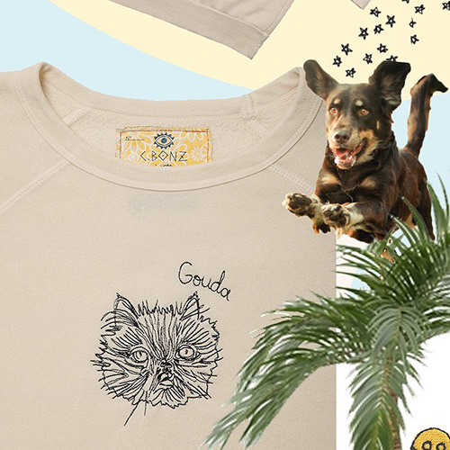 c.bonz t-shirt, a small brown dog 