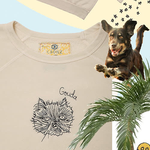 c.bonz t-shirt, a small brown dog 