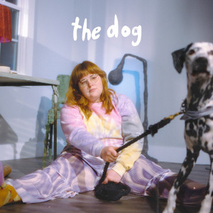 Corook holding a Dalmatian on a leash for her new song called The Dog.