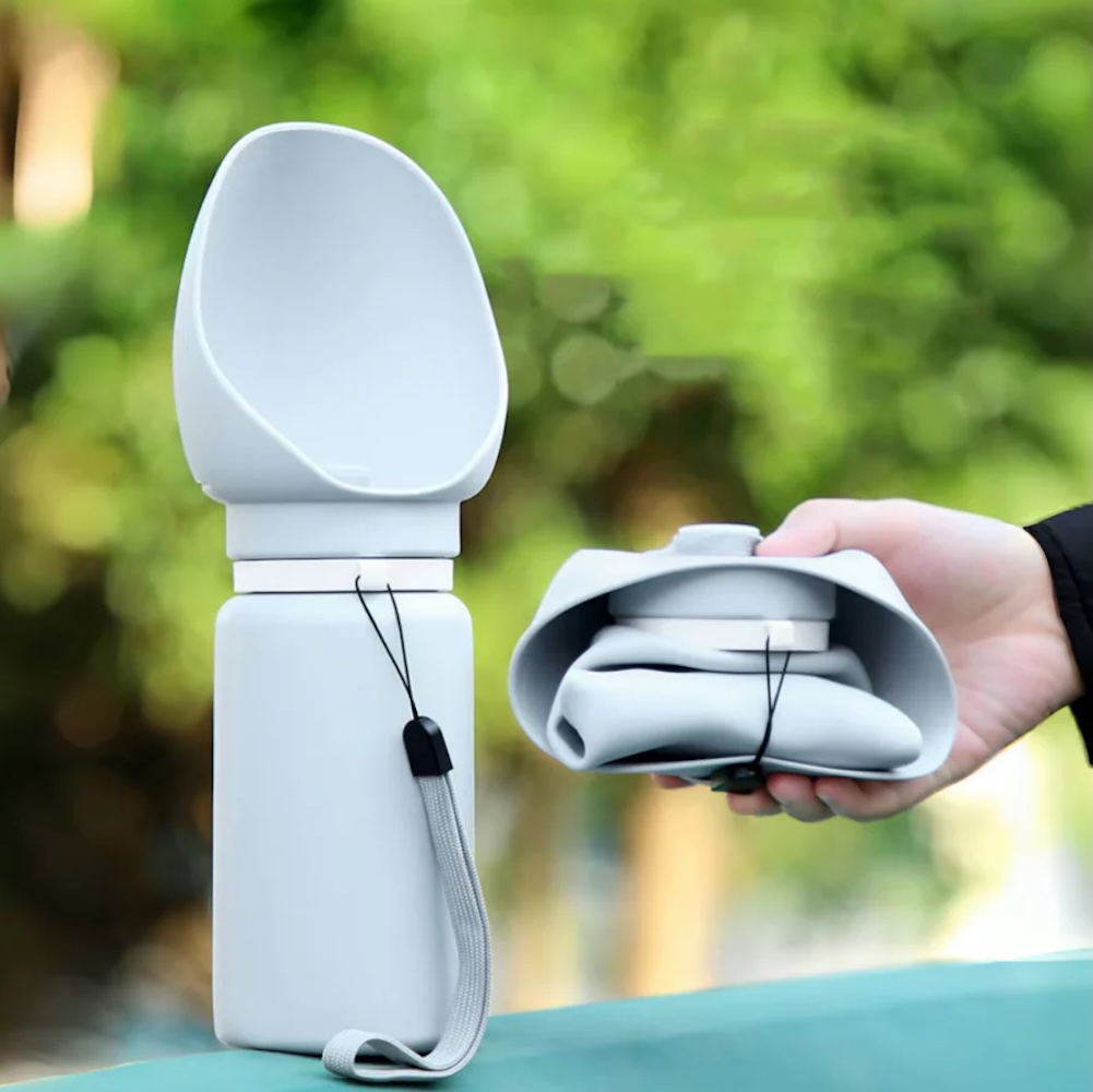 a picture of a grey collapsible water bottle for dogs