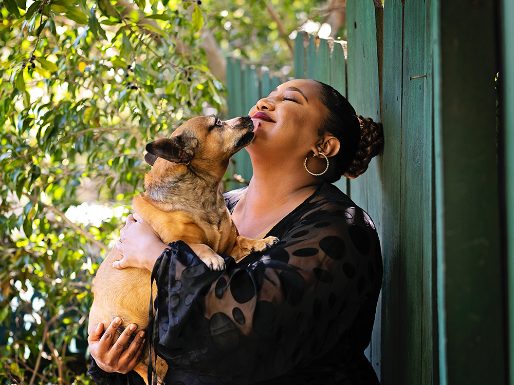 Ashley Nicole Black and her small dog, Gordi