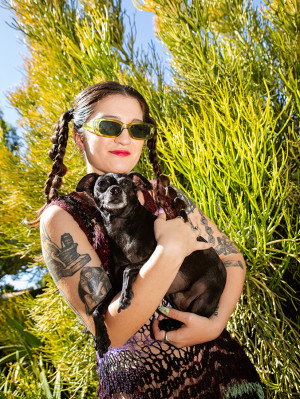 Arabelle Sicardi holds their dog, Titan 
