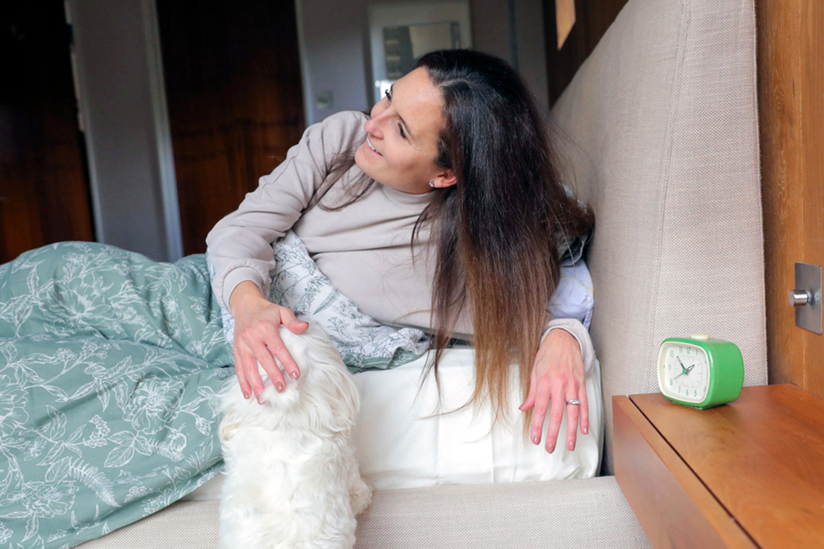 dog with a person near a clock