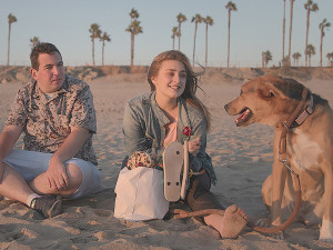 abbey and david, love on the spectrum, with a dog