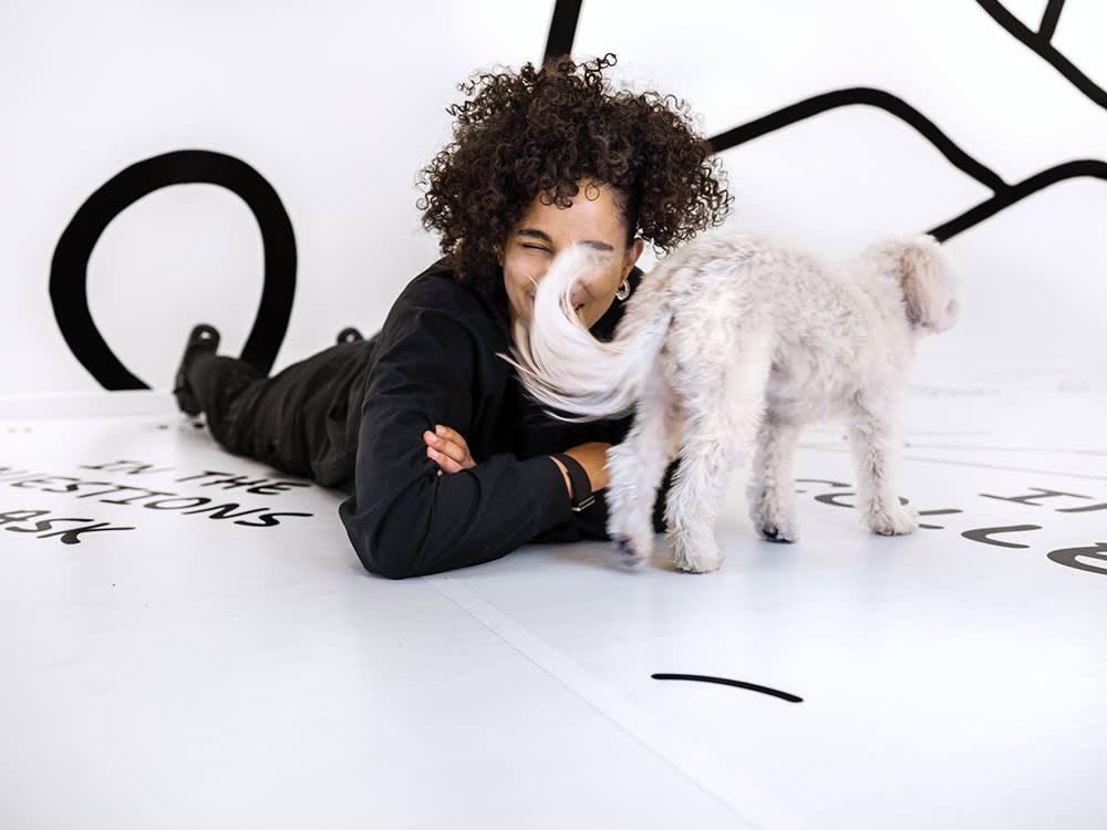 Shantell Martin with her small white dog, Blanche